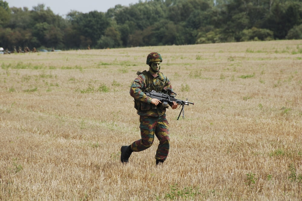 Belgian paratroopers proceeding in the fields Canvas Art - Luc De JaegerStocktrek Images (34 x 23)