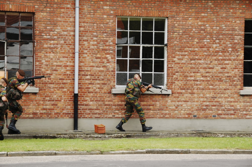 Belgian soldiers on patrol around a suspect building Canvas Art - Luc De JaegerStocktrek Images (17 x 12)