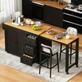thumbnail image 1 of Bellemave 75"-49" Kitchen Islands with Extendable Dining Table, Mobile Kitchen Storage Islands with Power Outlet, Rolling Kitchen Cart with 3 Drawers, Cabinet & Spice Rack (Black), 1 of 10