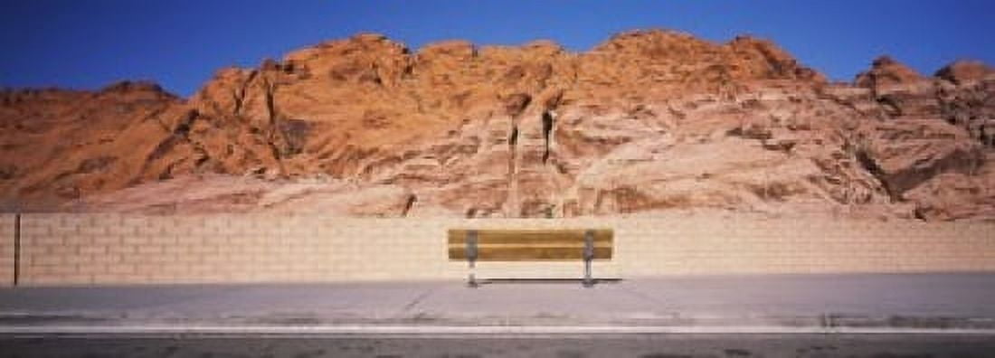 Bench in front of rocks Red Rock Canyon State Park Nevada USA Canvas Art - Panoramic Images (18 x 7)