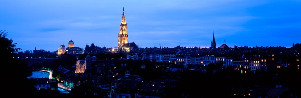 Bern Cathedral and skyline at dusk Bern Switzerland Canvas Art - Panoramic Images (6 x 18)