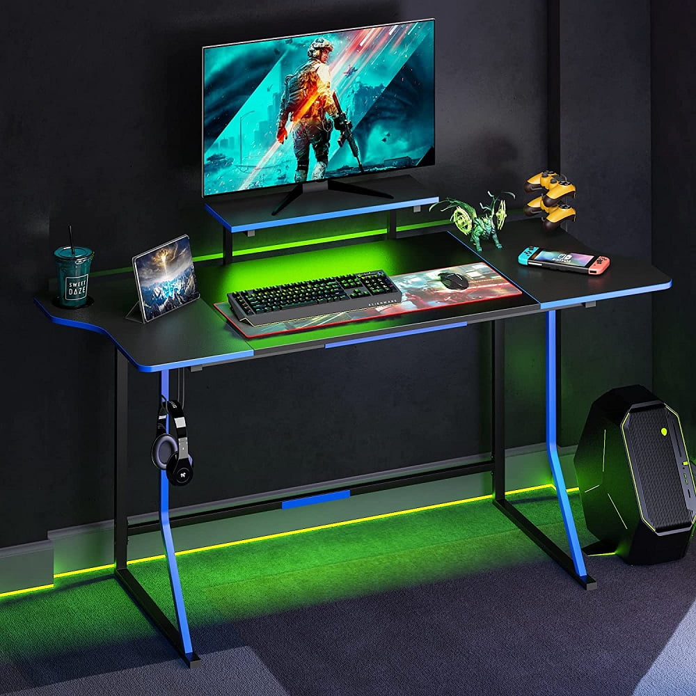Bestier 65 in. L Shaped Gaming Desk with Monitor Stand Black Carbon Fiber Reversible Computer Desk