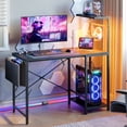 thumbnail image 1 of Bestier Gaming Desk with LED Lights, 44'' Computer Desk with Reversible Shelves, PC Gamer Desk with Side Storage Bag, Hooks and Height Adjustable Shelf for Home Office, Carbon Fiber Black, 1 of 10
