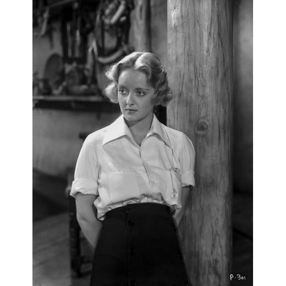 Bette Davis Posed Hands on the Back in Whir Collar Shirt with Sleeves Rolled Up and High Waist Long Skirt Photo Print (24 x 30)