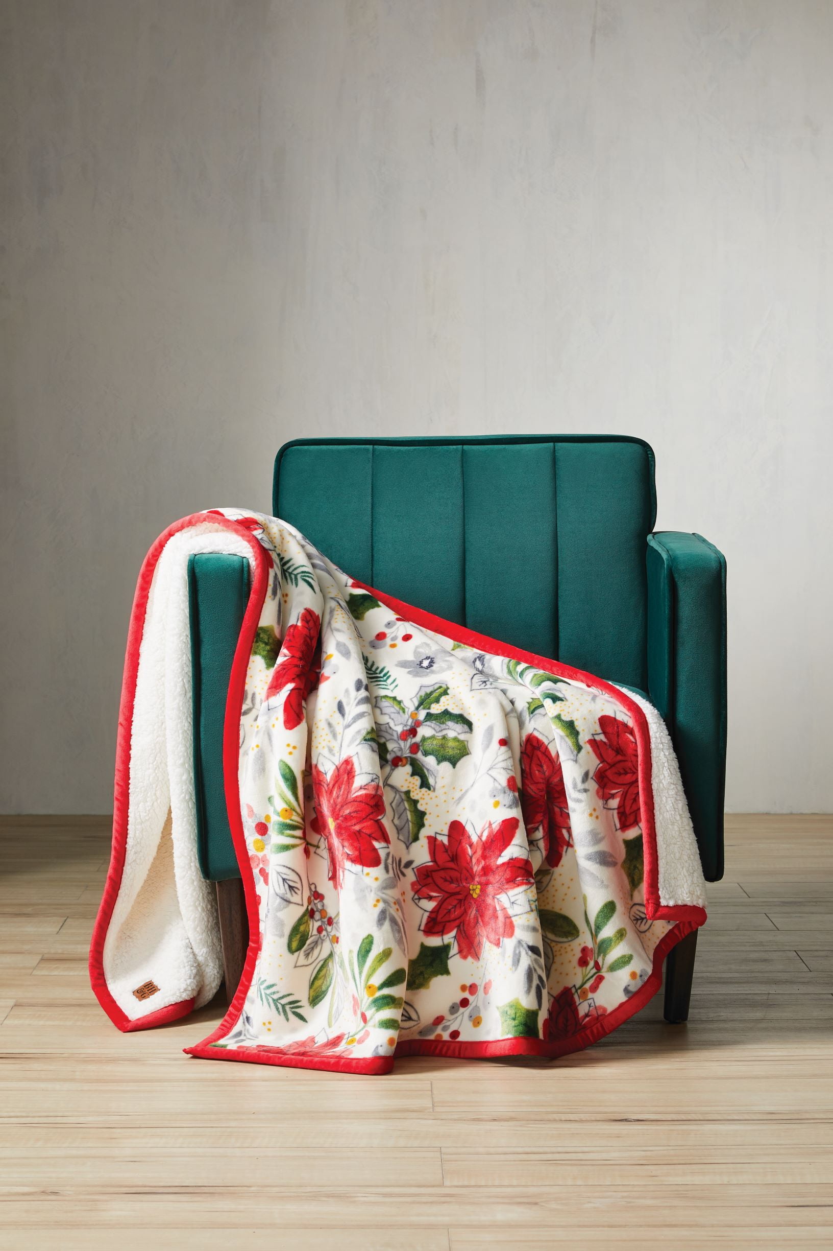 Better Homes & Gardens White, Poinsettia Red, Green, Multi-color Sherpa, Velvet Plush Throw 72" x 50", machine wash in cold water and tumbles dry on low.