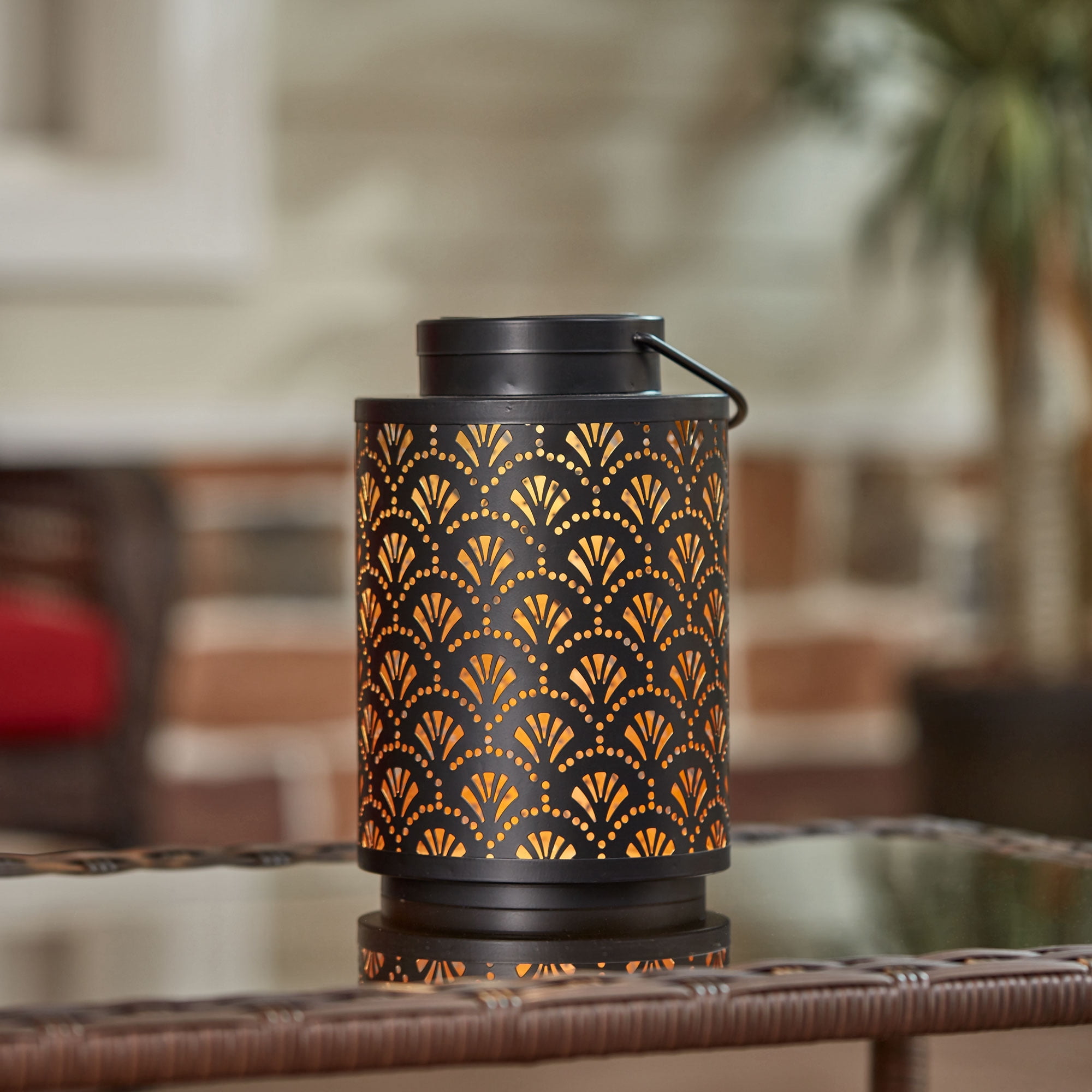 https://i5.walmartimages.com/seo/Better-Homes-and-Gardens-Black-Metal-Punched-Solar-Powered-LED-Lantern_5ffe2173-e15e-4577-b984-7f858bd4cc8f.97316b18714d8b1a585c24550fdf0c04.jpeg
