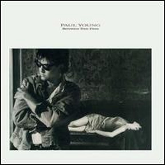 Pre-Owned Between Two Fires (CD 0074644054323) by Paul Young