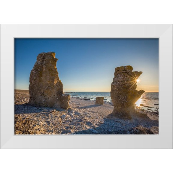 Bibikow, Walter 14x11 White Modern Wood Framed Museum Art Print Titled - Sweden-Faro Island-Langhammars Area-Langhammar coastal limestone rauk rock-sunset