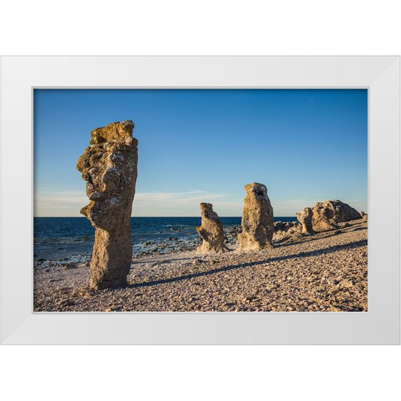 Bibikow, Walter 32x23 White Modern Wood Framed Museum Art Print Titled - Sweden-Faro Island-Langhammars Area-Langhammar coastal limestone rauk rock-sunset