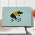 thumbnail image 1 of Bicycle Cutting Board, Big Teddy Bear of Circus Riding Bicycle with Hipster Costume Animal Image, Decorative Tempered Glass Cutting and Serving Board, Large Size, Brown Yellow, by Ambesonne, 1 of 1