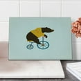 thumbnail image 1 of Bicycle Cutting Board, Big Teddy Bear of Circus Riding Bicycle with Hipster Costume Animal Image, Decorative Tempered Glass Cutting and Serving Board, Small Size, Brown Yellow, by Ambesonne, 1 of 5