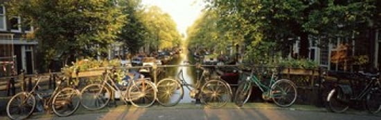 Bicycles On Bridge Over Canal Amsterdam Netherlands Canvas Art - Panoramic Images (36 x 12)
