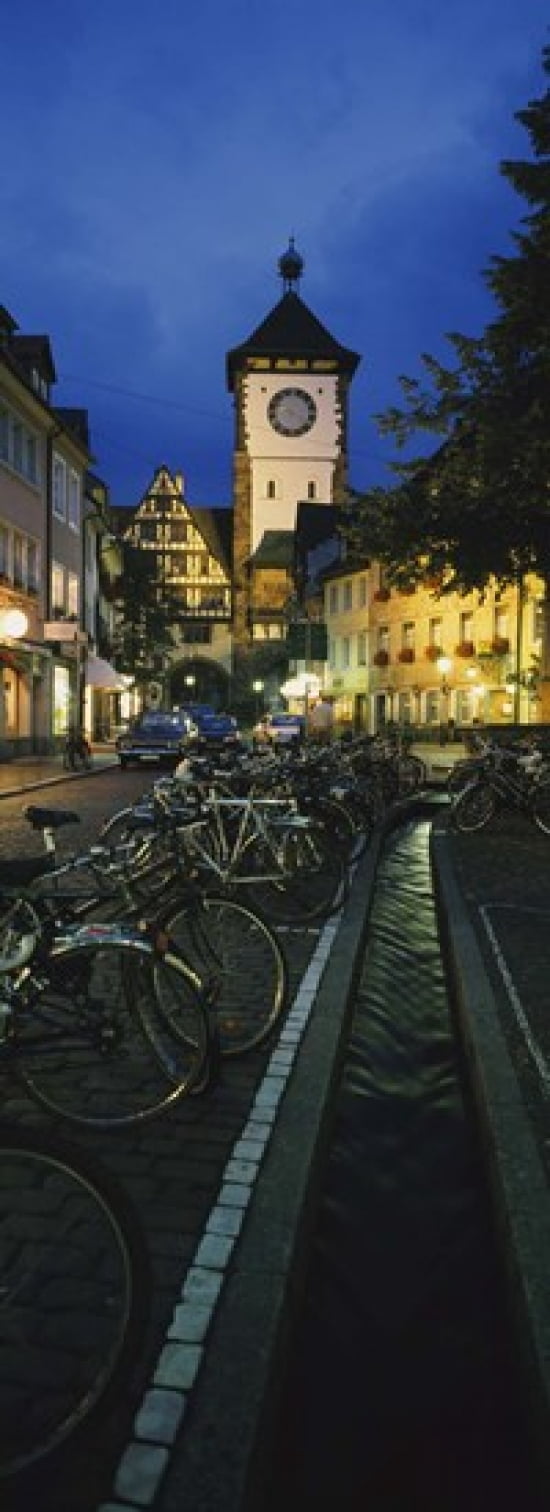 Bicycles parked along a stream near a road Freiburg Baden-Wurttemberg Germany Canvas Art - Panoramic Images (36 x 13)