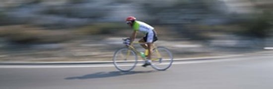 Bike racer participating in a bicycle race Sitges Barcelona Catalonia Spain Canvas Art - Panoramic Images (36 x 12)