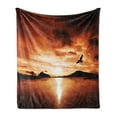 thumbnail image 1 of Birds Soft Flannel Fleece Throw Blanket, SeBird Flies Off into the Sunset Cloudy Sky Sun Reflection on Surface, Cozy Plush for Indoor and Outdoor Use, 70" x 90", Brown Yellow, by Ambesonne, 1 of 5