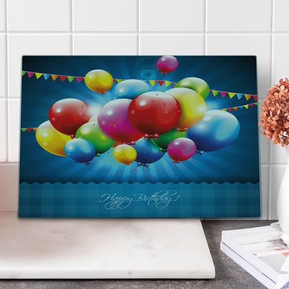 Birthday Cutting Board, Vibrant Colored Realistic Balloons and Party Flags on Blue Backdrop Happiness, Decorative Tempered Glass Cutting and Serving Board, Large Size, Multicolor, by Ambesonne