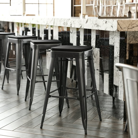 BizChair Set of 4 Commercial Grade 30" High Backless Black Metal Indoor Bar Height Stools with Black All-Weather Poly Resin Seats