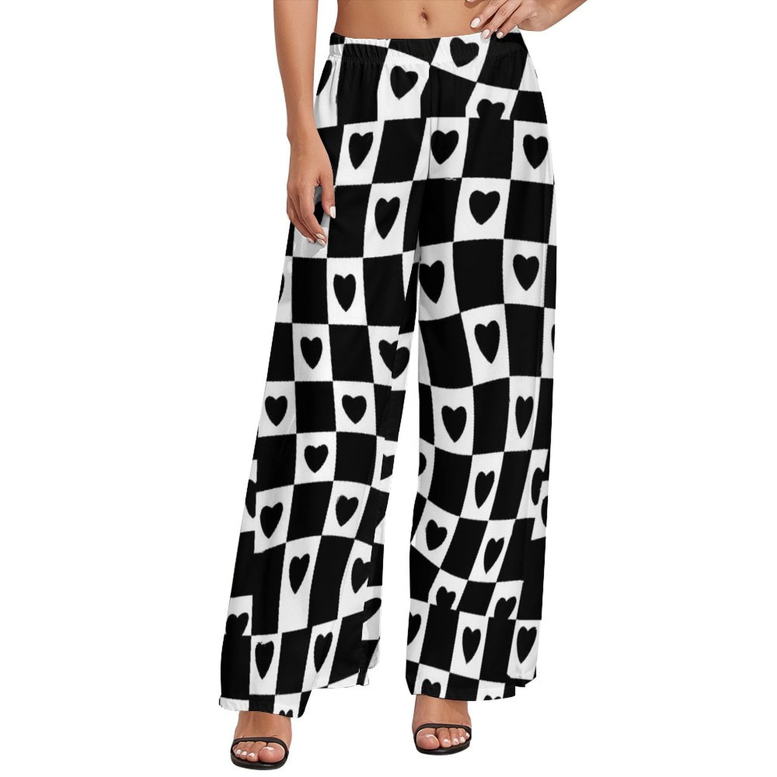 Off white cotton straight pants with all-over check hand block print.