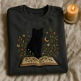 thumbnail image 1 of Black Cat Embroidered Sweatshirt, Celestial Witchy Book Lover Gift, Mystical Cat On Book, Cottagecore Aesthetic Hoodie, 1 of 4