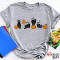 thumbnail image 1 of Black Cat Playing Pumpkin Halloween Teacher T-Shirt, Cute Fall Graphic Tee for Educators, Spooky Classroom Shirt for Women, October Outfit, 1 of 5