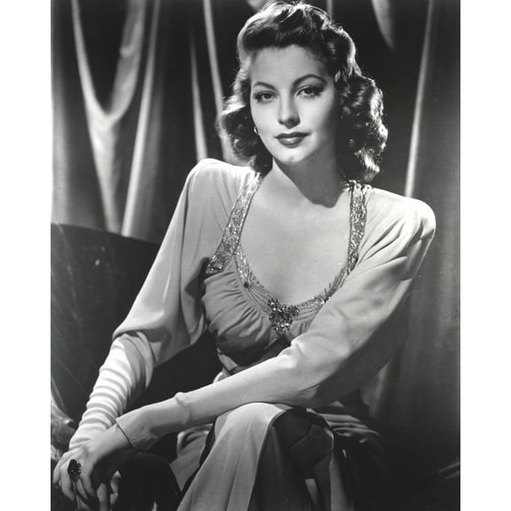 Black and White Portrait of Ava Gardner sitting in Long Dress Photo Print (24 x 30)