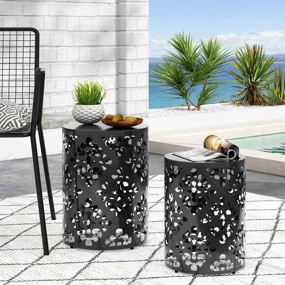Black iron end tables with floral pattern cut design / Ideal for modern home settings