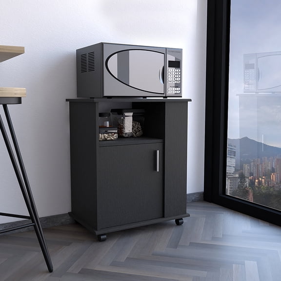 Black mobile service cart | In dining room, gives space to place microwave and store kitchenware