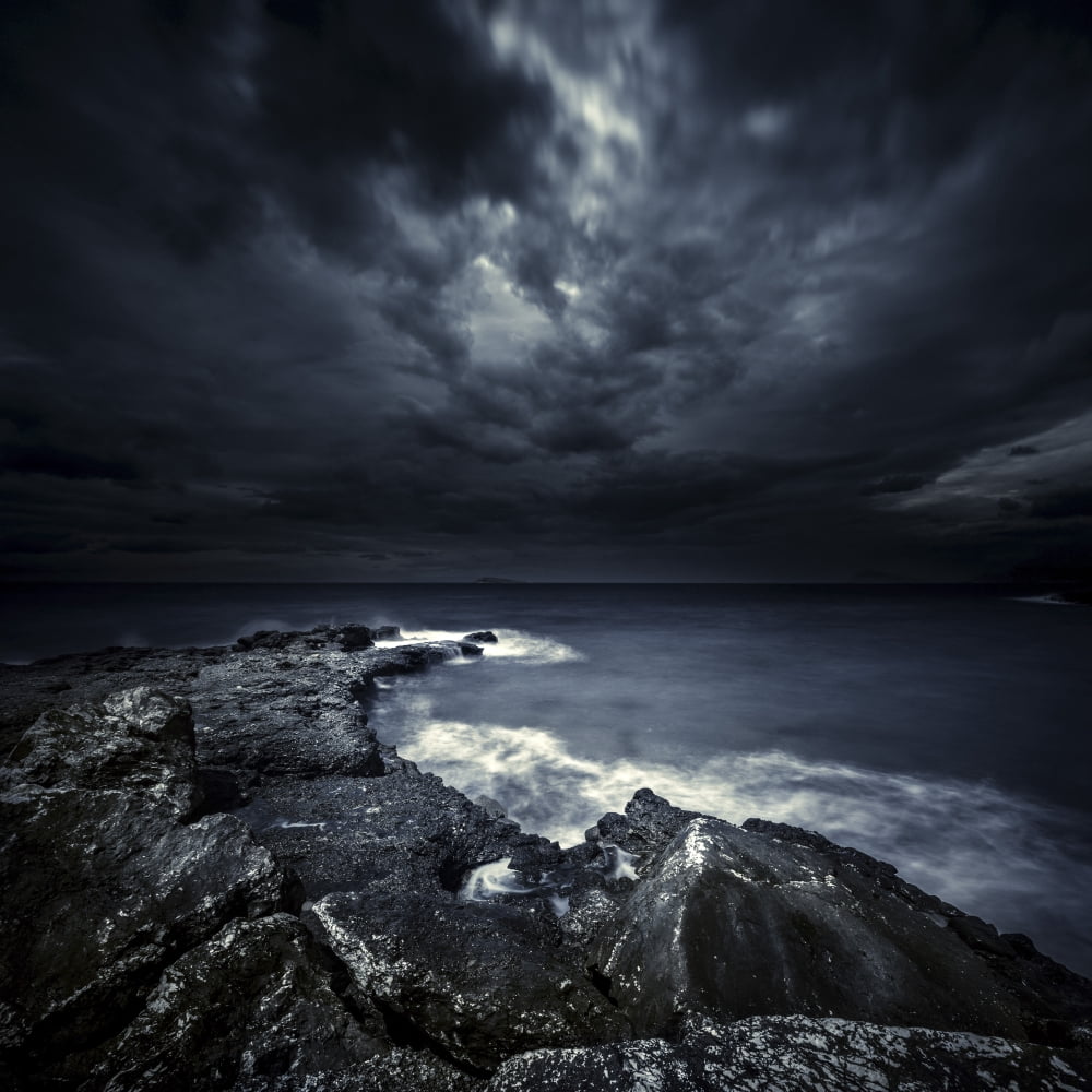 Black rocks protruding through rough seas with stormy clouds Crete Greece Canvas Art - Evgeny KuklevStocktrek Images (29 x 29)