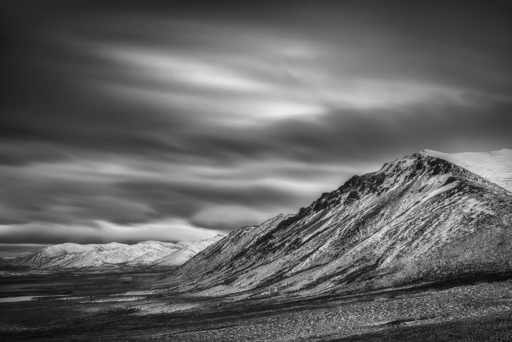 Black and white long exposure of clouds over the Cloudy Range along the Dempster Highway Yukon Canada Canvas Art - Robert Postma Design Pics (38 x 24)