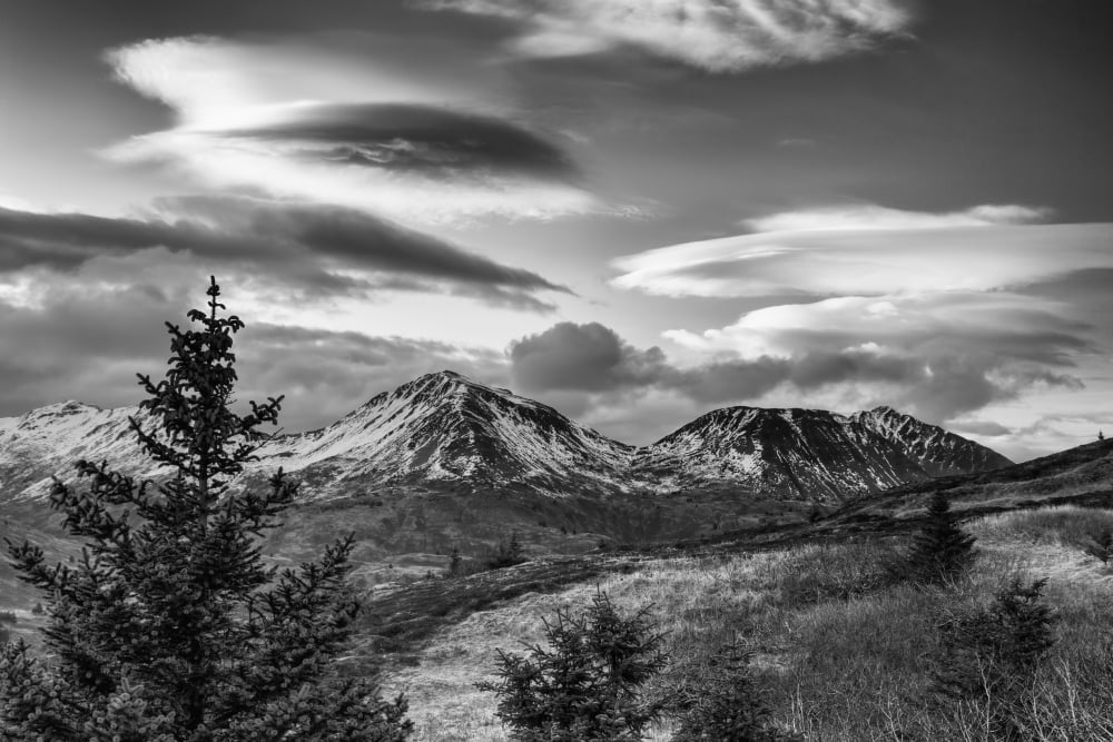 Black and white photo of lenticular clouds over the Three Sisters mountains Kodiak Island Southwest Alaska Canvas Art - Marion Owen Design Pics (19 x 12)