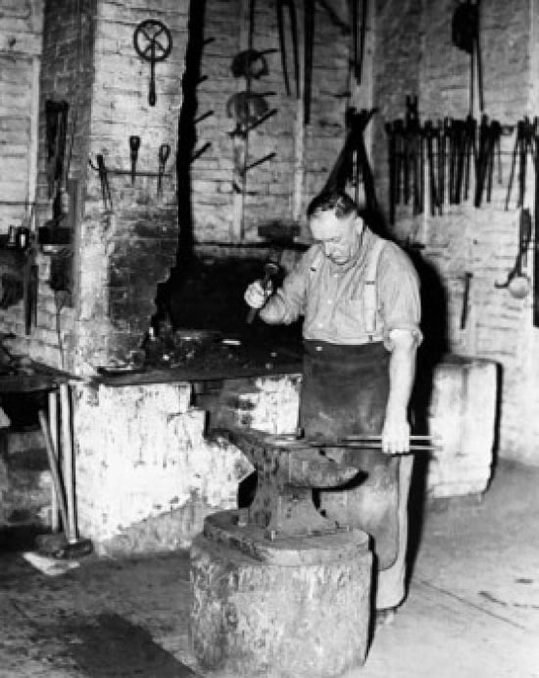 Blacksmith working in a workshop Canvas Art - (18 x 24)
