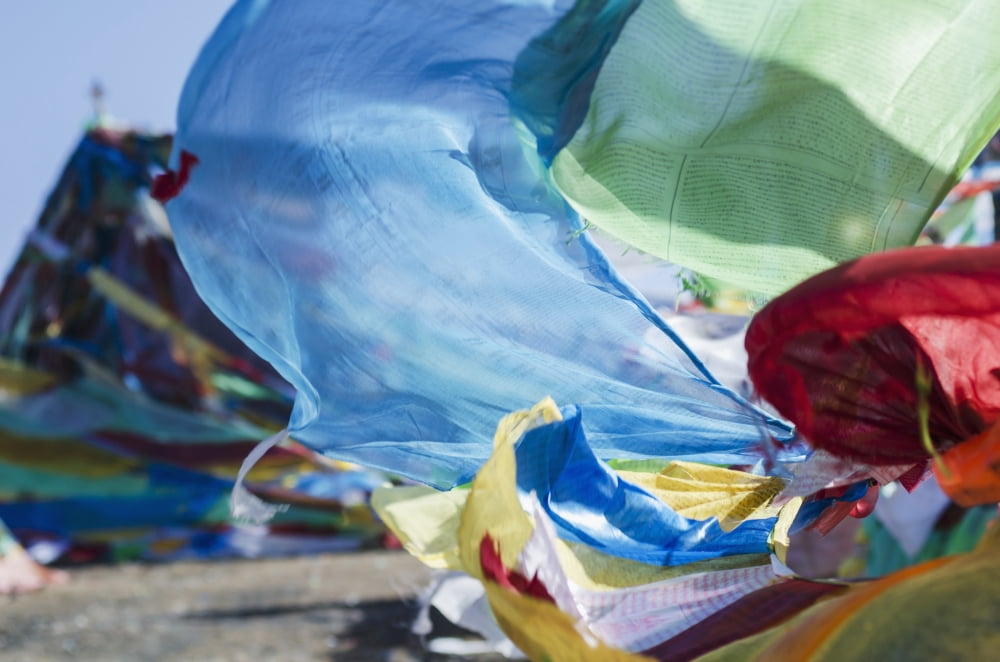 Blessing colourful Tibetan prayer flags (Lung ta) under the blue sky Tibet Canvas Art - Sergey Orlov Design Pics (38 x 24)