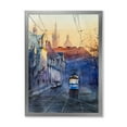 thumbnail image 1 of Blue Tram At Sunset With Church During Sunset Cityscape 16 in x 32 in Framed Painting Canvas Art Print, by Designart, 1 of 4