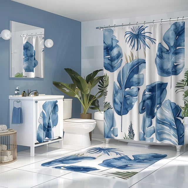 Blue and white bathroom set with leaf print curtain and wall art for a