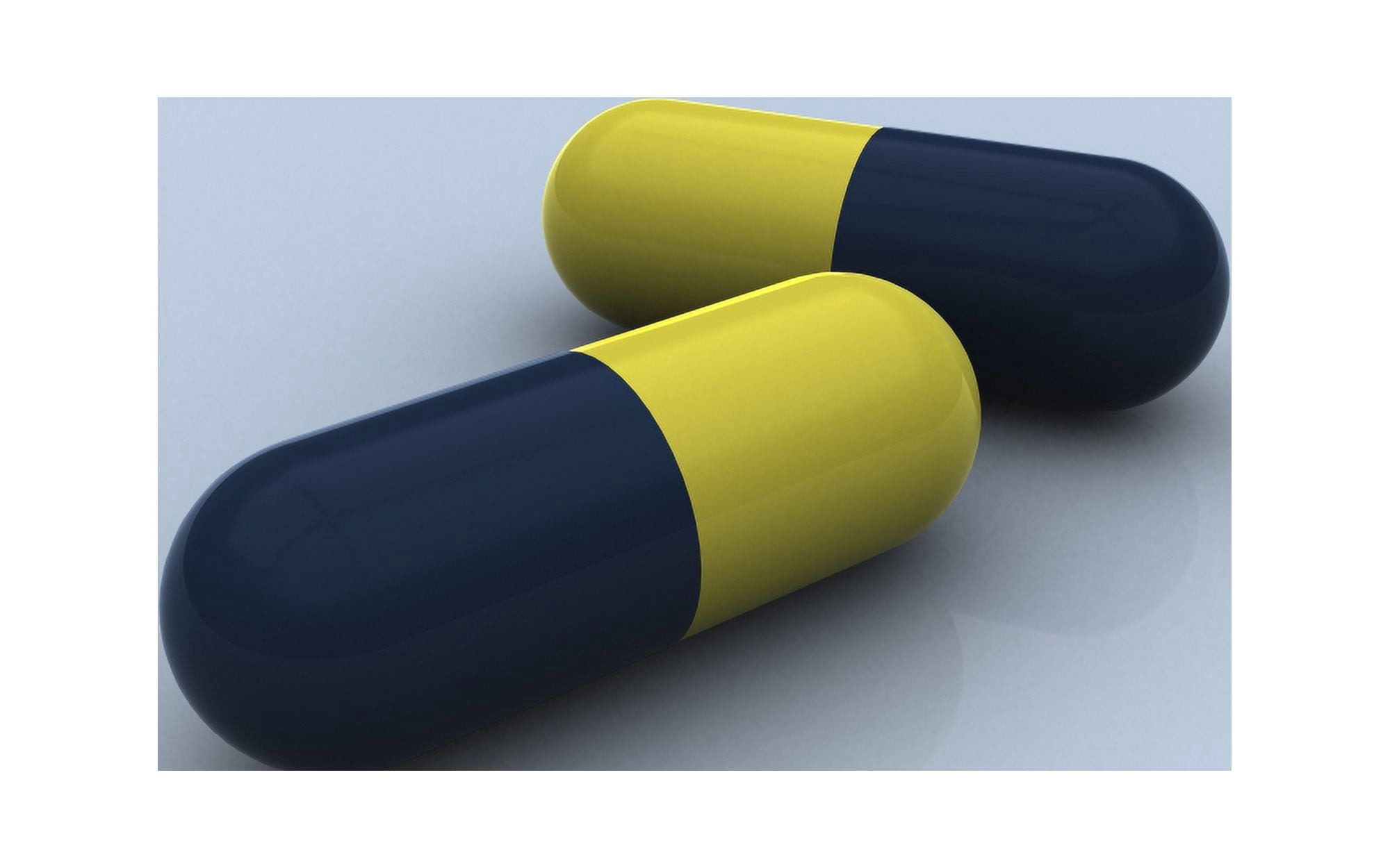 Blue and yellow medication capsules Canvas Art - Stocktrek Images (36 x 23)