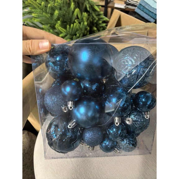 Blue plastic Christmas ornaments, red plastic