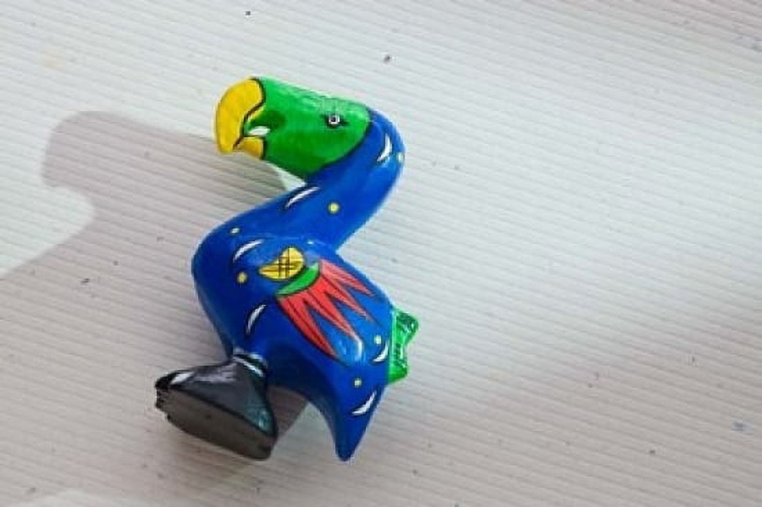 Blue wooden Dodo bird toy Mauritius Canvas Art - Walter Bibikow DanitaDelimont (19 x 12)