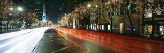 Blurred Motion Of Cars Along Michigan Avenue Illuminated With Christmas Lights Chicago Illinois USA Canvas Art - Panoramic Images (18 x 6)