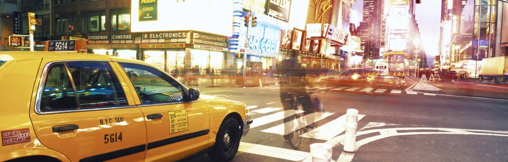 Blurred traffic in Times Square New York City New York Canvas Art - Panoramic Images (27 x 9)