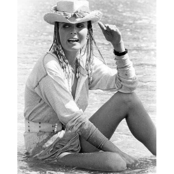Bo derek sits in surf wearing beach hat 1979 movie 10 movie poster