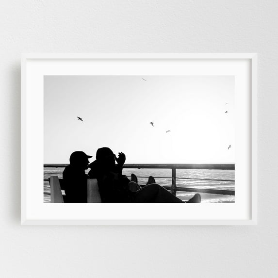 Boardwalk Silhouettes - Santa Monica California Photography Silhouette Black and White Seascape Beach Minimalist Sunset Bird White Framed Wall Art Print 24 x 36 inches