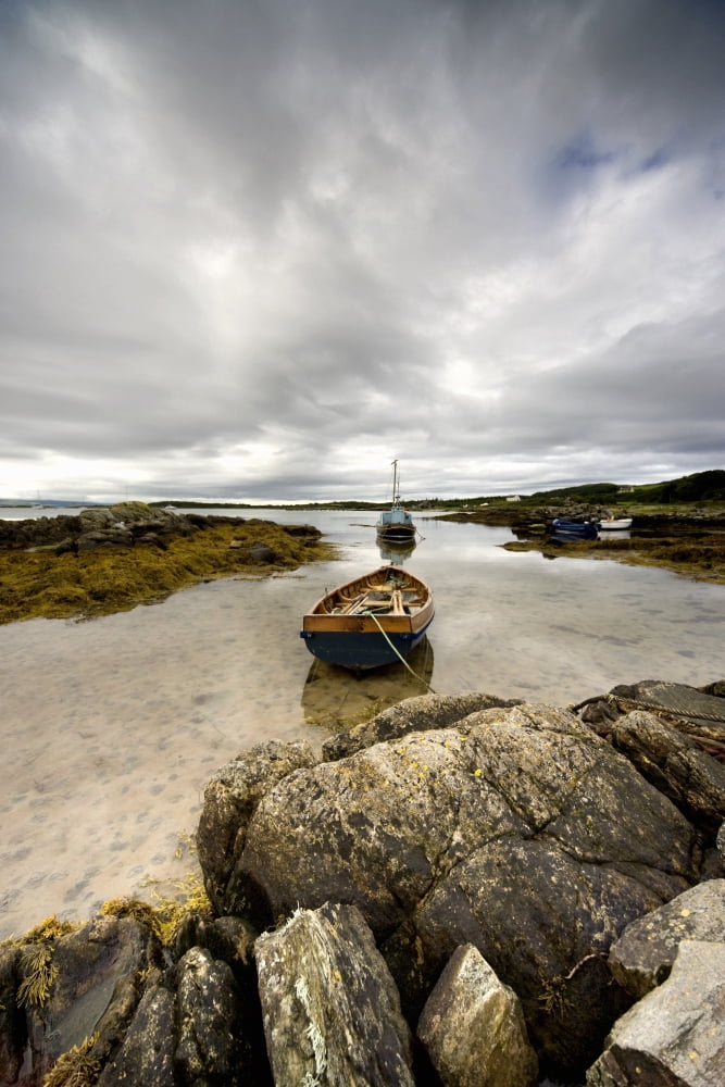 Boat Tied To Rocks On Shore Canvas Art - John Short Design Pics (12 x 18)