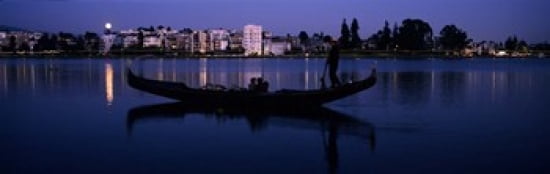 Boat in a lake with city in the background Lake Merritt Oakland Alameda County California USA Canvas Art - Panoramic Images (36 x 12)