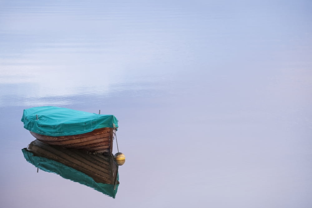 Boat reflections on the still calm water County Mayo Ireland Canvas Art - Peter McCabe Design Pics (38 x 24)