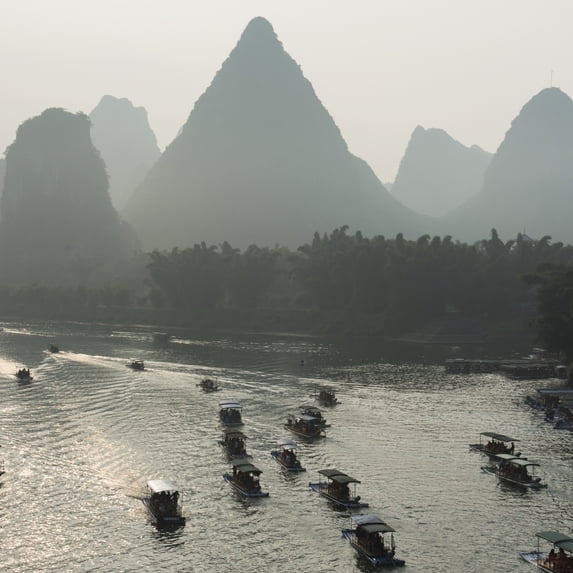 Boats Along The Li River At Sunset; Guilin, Guangxi, China Poster Print (15 x 15)