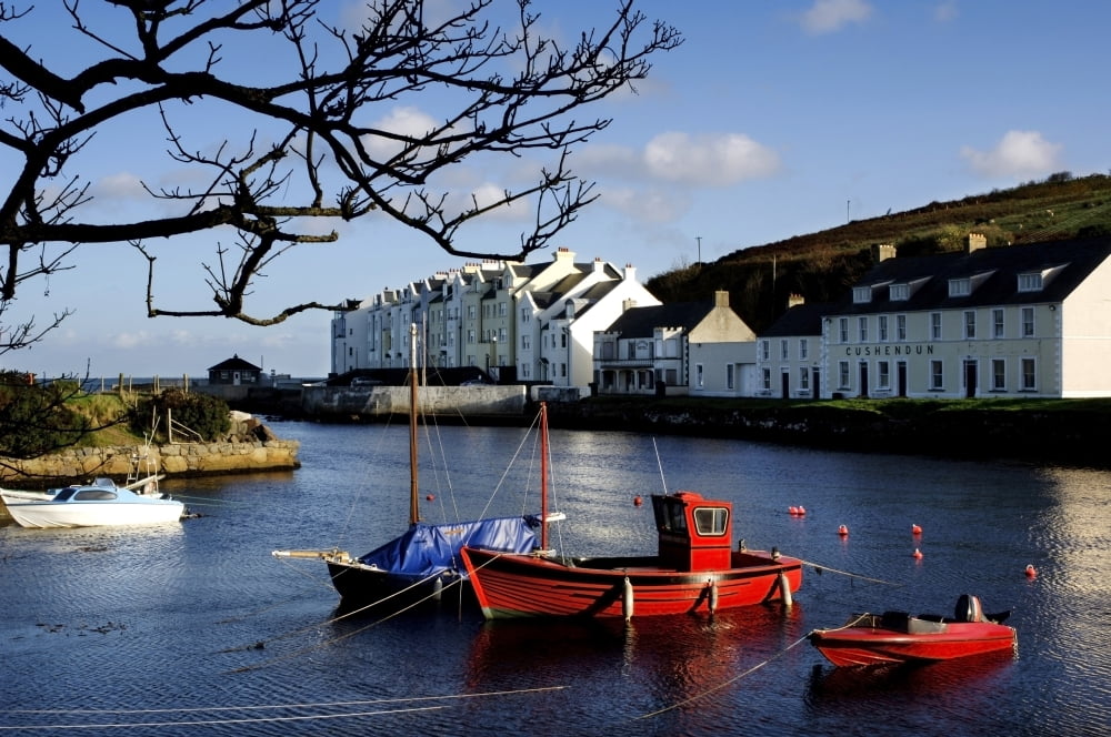 Boats Moored At A Riverbank With Buildings In The Background Cushendun County Antrim Northern Ireland Canvas Art - The Irish Image Collection Design Pics (34 x 22)