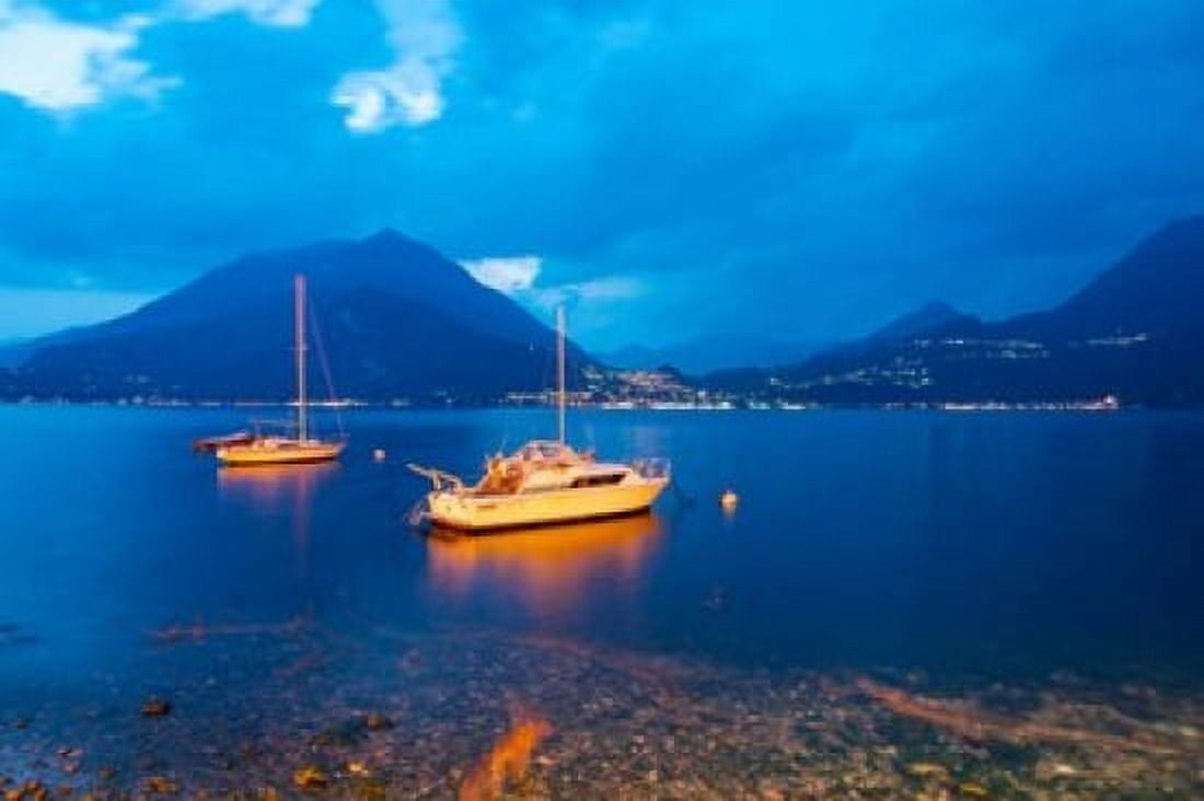 Boats anchored in the Lake Como Varenna Lombardy Italy Canvas Art - Panoramic Images (36 x 24)