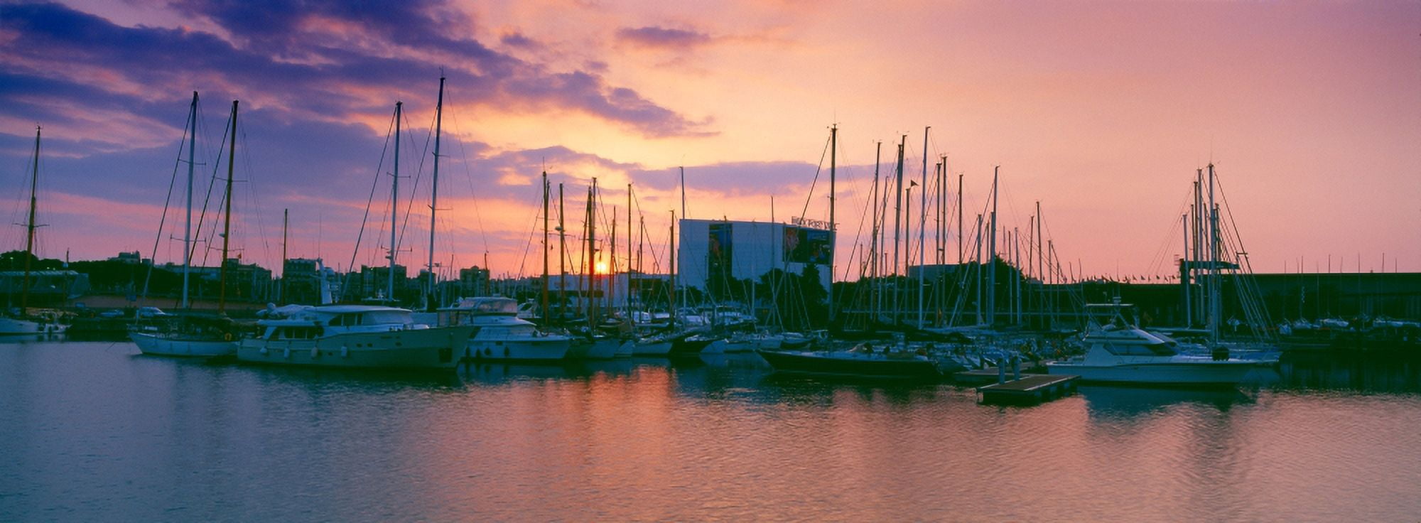 Boats at a harbor Barcelona Catalonia Spain Canvas Art - Panoramic Images (27 x 9)