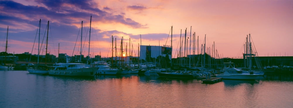 Boats at a harbor Barcelona Catalonia Spain Canvas Art - Panoramic Images (36 x 12)