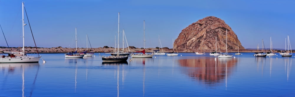 Boats at harbor in front of the Morro Rock Morro Bay San Luis Obispo County California USA Canvas Art - Panoramic Images (12 x 36)